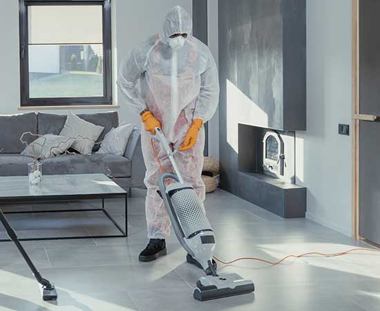 Technician preparing pest control equipment